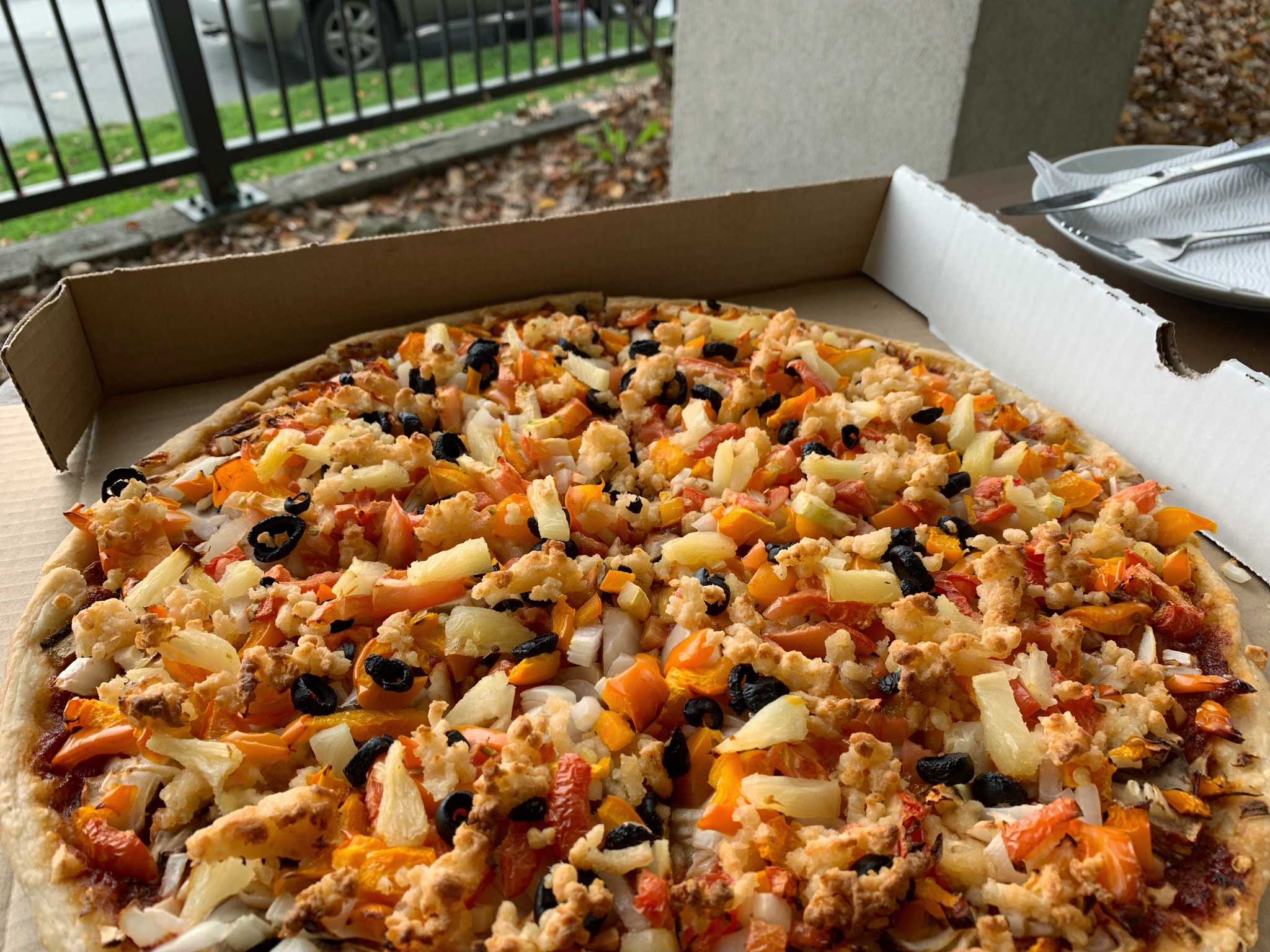 Plant-based pizza ready to serve at a gathering